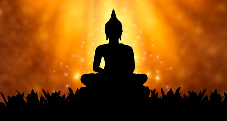 Buddha statue Silhouette Buddha sitting on lotus flower on orange backgroundの写真素材