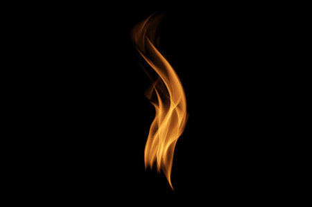 Flames on black background. Fire blaze flames on black background. Fire burn flame isolated, abstract texture. Flaming explosion effect with burning fire.の写真素材