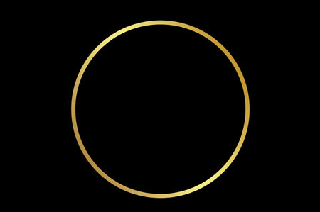 Gold circle frame on black backgroundの写真素材