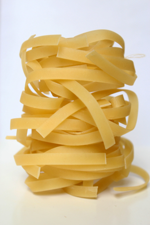 Macaroni round isolated on white background yellow isolateの写真素材