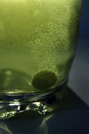 Tablet effervescent in a glass medicine dissolves cold cold  hospital close planの写真素材