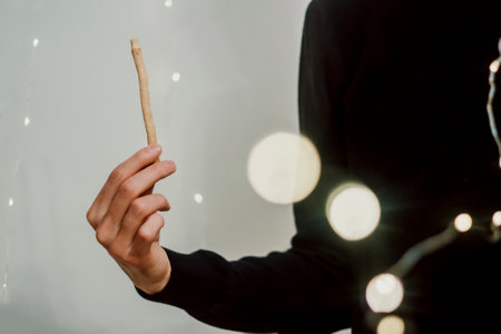 Guy hold miswak. Bokeh effect. Teeth cleaning. Sunnah. Sivakの写真素材