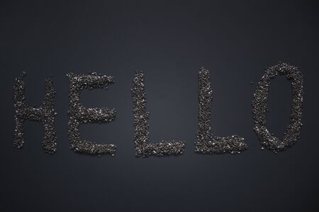 Word HELLO written with chia seeds on gray background, top view, copy space.の写真素材