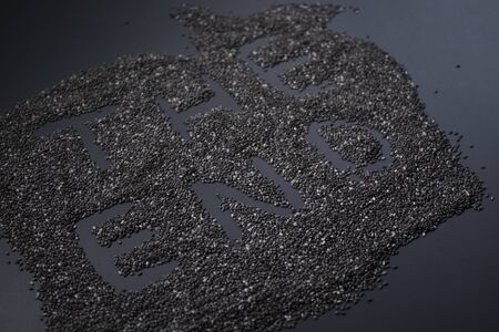 Words THE END written with chia seeds on gray background, top view, copy space.の写真素材