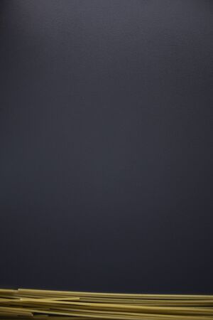 spaghetti on gray background, top view, copy space. Food supplies, food donation on quarantine while coronavirus.の写真素材