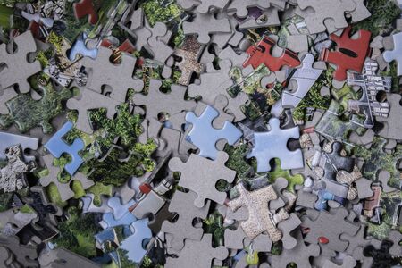 multicoloured puzzles on a white background. isolated. Top view. High quality photoの写真素材