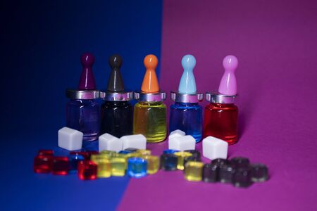 Elements - attributes for board games - figures, cards, cubes, bottles, points, houses. On pink and...