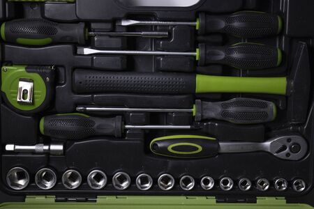 A set of building tools and instruments for repair in black and green colour. Must-have for men....