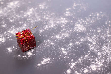 Christmas decorations in the snow - gift. Christmas mood.