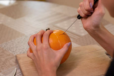 the process of making a Halloween pumpkin.の写真素材
