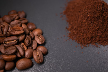 pile of ground or instant coffee and roasted coffee beans seeds. background.の写真素材