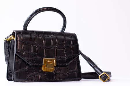 trendy black leather handbag isolated on white background. product photography. bags and purses for...