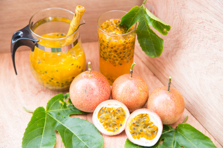 Passion fruits on wooden backgroundの写真素材