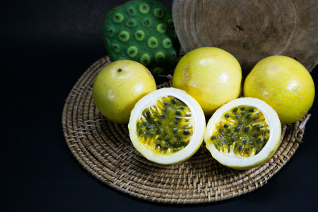 passion fruits on black background