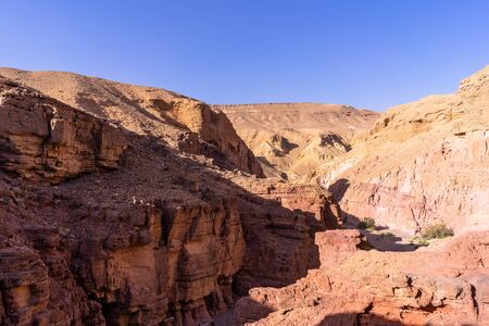 Sharp photos of colorful sandstone cliffs of the Red Canyon in the mountains of Southern Eilat,...