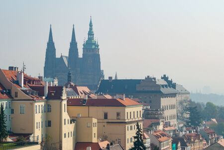 Fog morning photo of Prague city, Saint Vitus cathedral and Vltava riverの写真素材