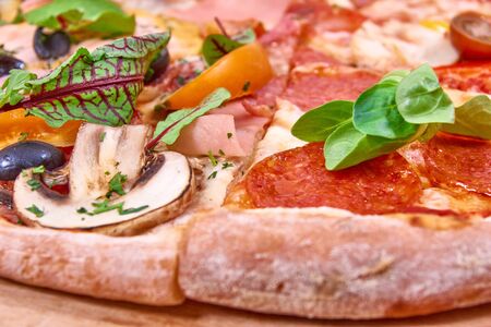 Different Pizza slices closeup photo. Prepared, deliveryの写真素材