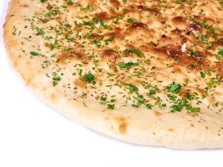 Italian focaccia bread with spicies isolated on white