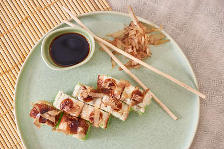 Fresh sushi rolls on a plateの写真素材