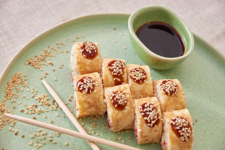 Fresh sushi rolls on a plate