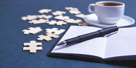 puzzles notebook coffee