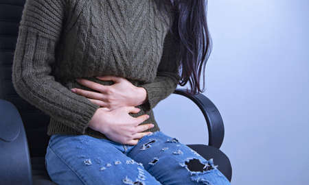 stomach pain girlの写真素材