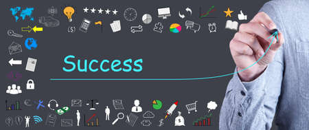 businessman draws an arrow of successの写真素材
