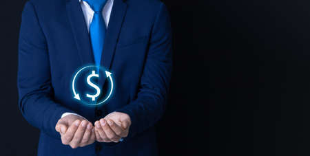 businessman against black background in hands dollar illustration iconの写真素材