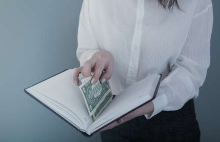 hide money in a book