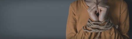 girl with tied hands; slavery conceptの写真素材