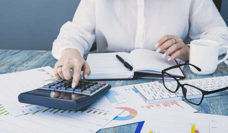 secretary checks annual report, business concept