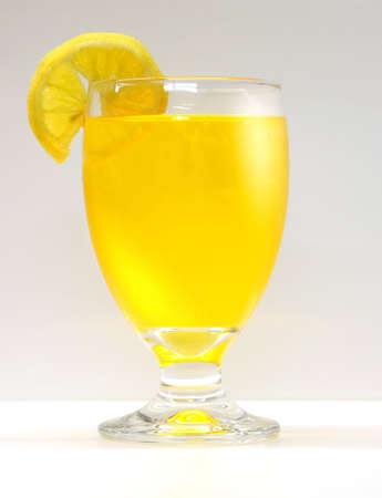 orange juice glass with lemonの写真素材