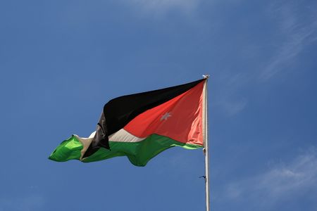 Jordan flag against the blue skyの写真素材