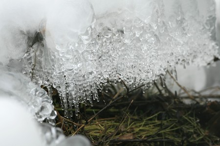 Decoratice icicles from freezing waterの写真素材