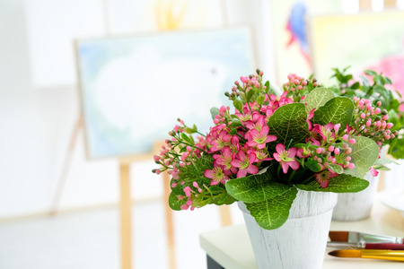 Pink flowers are in a white vase. Placed in the classroom to teach the arts as an example. And beautyの写真素材