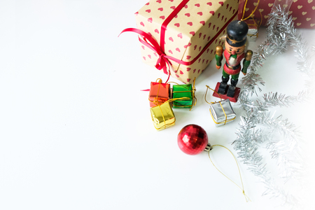 Rainbow gift box Christmas tree decoration balls placed on a white table.の写真素材