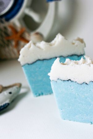 Handmade soap, salt formulated with blue and white on the tableの写真素材