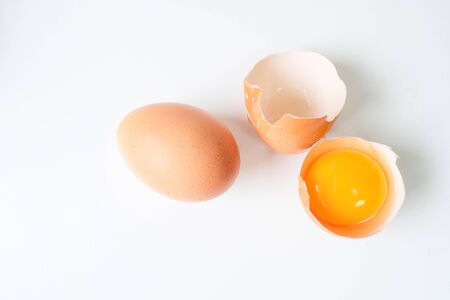 Fresh eggs from the farm placed on a white wooden table backgroundの写真素材