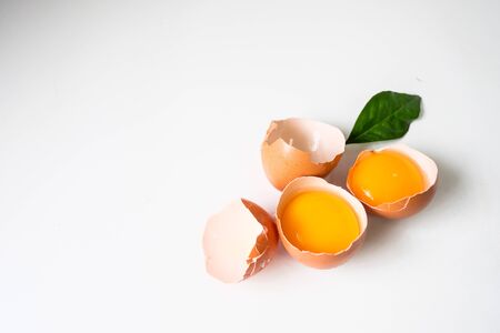 Fresh eggs from the farm placed on a white wooden table backgroundの写真素材