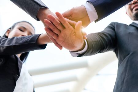 Group of business people stand congratulated.の写真素材