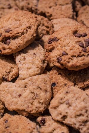 Chocolate chip cookies background to add textの写真素材