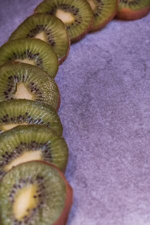 Background with kiwis to add textの写真素材