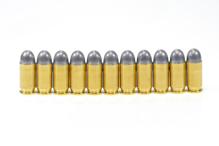 11mm. Ammunition isolated on whiteの写真素材