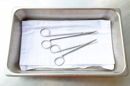 Medical instruments in a steel trayの写真素材