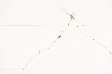 cracked wall white background textureの写真素材