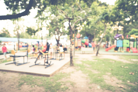 children's playground activities at public park,blurred image for background