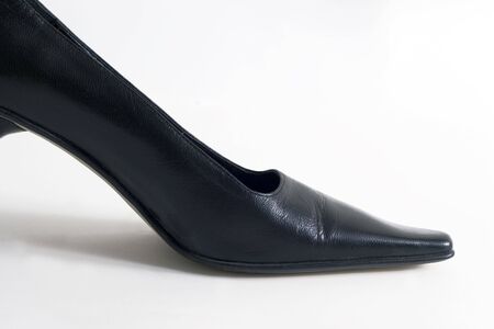 Close up Black high heel shoes on white backgroundの写真素材