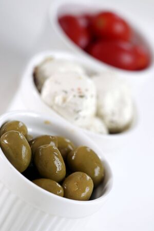 Breakfast with cheese, olive and tomato .の写真素材