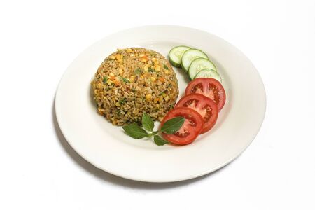 traditional Indonesian food fried rice. Fried rice with white backgroundの写真素材