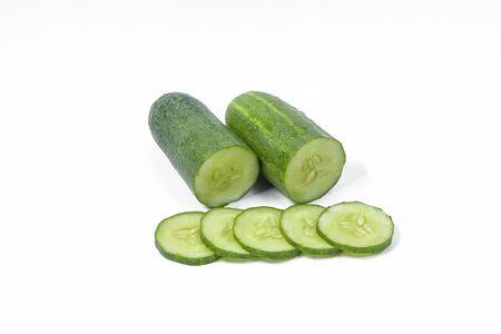 cucumber with slice isolated on white backgroundの写真素材